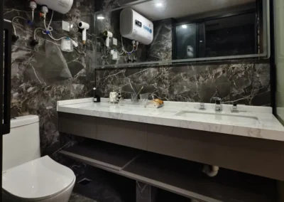 BAUSTADT Capsule House Model E8 modern bathroom with shower and sink
