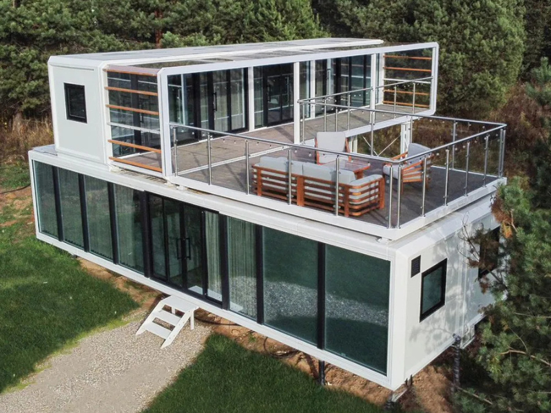 BAUSTADT Apple Cabin Model D1 modern two story modular cabin with rooftop terrace and large glass walls