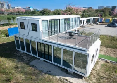 BAUSTADT Apple Cabin Model D1 elevated view showing glass walls and rooftop deck